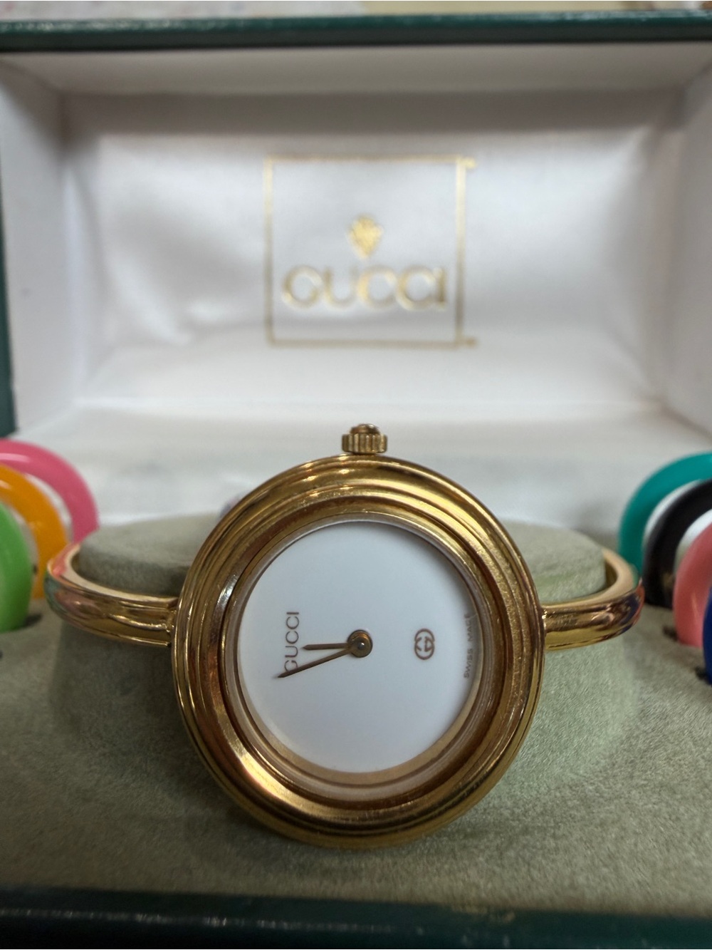 Gucci Gold Tone Bezel